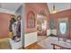 Charming foyer with a coat rack and a glimpse into a cozy seating area at 522 W Butternut Rd, Summerville, SC 29483
