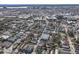 Expansive aerial view capturing the cityscape, neighborhood blocks, and green spaces under a clear sky at 53 America St, Charleston, SC 29403