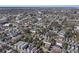 A vibrant aerial perspective captures the city's architectural mix and street layout under the bright sun at 53 America St, Charleston, SC 29403