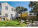 A tranquil backyard with comfortable seating around a fire pit, offering a perfect spot for relaxation at 53 America St, Charleston, SC 29403