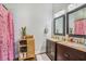 Bathroom features double sinks, granite countertops, and storage at 53 America St, Charleston, SC 29403
