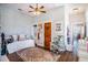 Bedroom offers a daybed, washer/dryer, and hardwood floors at 53 America St, Charleston, SC 29403