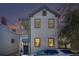 Inviting two-story home with a cozy front porch, perfect for enjoying the neighborhood view at 53 America St, Charleston, SC 29403