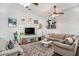 Inviting living room with comfortable seating, unique decor, and a patterned rug at 53 America St, Charleston, SC 29403