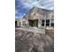 Spacious backyard with a large concrete patio, perfect for outdoor entertaining at 586 Marsh Cove Cir, Summerville, SC 29486