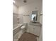 Bathroom featuring a tub-shower, toilet, vanity and mirror in a simple design at 586 Marsh Cove Cir, Summerville, SC 29486