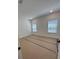Bright bedroom with two windows and white trim, offering a serene retreat at 586 Marsh Cove Cir, Summerville, SC 29486