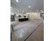 Spacious open floor plan with an island kitchen, modern appliances, and decorative trim at 586 Marsh Cove Cir, Summerville, SC 29486