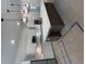 Modern kitchen with white cabinets, a large island, pendant lighting, and stainless steel appliances at 586 Marsh Cove Cir, Summerville, SC 29486
