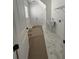 Clean laundry room with sink, door to the exterior and storage space at 586 Marsh Cove Cir, Summerville, SC 29486