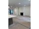 Bright living room featuring a fireplace and an open floor plan at 586 Marsh Cove Cir, Summerville, SC 29486