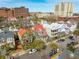 Charming neighborhood aerial view featuring colorful homes with red roofs and tree-lined streets at 6 Halsey St, Charleston, SC 29401