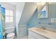 Bathroom featuring a pastel blue decor, toilet, shower curtain and sink at 6 Halsey St, Charleston, SC 29401