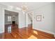 Spacious living room with hardwood floors, connecting to other rooms, and bright ambiance at 6 Halsey St, Charleston, SC 29401