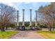 Iconic park featuring four stately columns surrounded by trees and a beautiful lawn at 6 Halsey St, Charleston, SC 29401