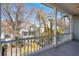 Charming porch with ample space for outdoor living and neighborhood views at 6 Halsey St, Charleston, SC 29401