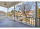 Spacious porch with white columns offering views of the neighborhood at 6 Halsey St, Charleston, SC 29401