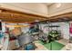 Spacious garage featuring a ping pong table, golf cart, and exposed wood beams at 74 6Th Ave, Charleston, SC 29403