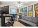 Cozy bedroom featuring a ceiling fan, futon, and decor at 840 Burger St, Charleston, SC 29407