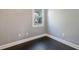 A bedroom offers hardwood floors, light gray walls, and white trim at 840 Burger St, Charleston, SC 29407