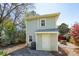 Exterior view of the back of the house, showcasing the two-story structure and backyard at 840 Burger St, Charleston, SC 29407