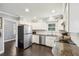 Updated kitchen with stainless steel appliances and granite countertops at 840 Burger St, Charleston, SC 29407