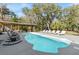 Beautiful backyard pool with lounge chairs, perfect for summer relaxation and entertainment at 8834 Palmetto Rd, Edisto Island, SC 29438
