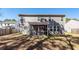 The backyard features a screened in porch at 9620 Corby Ct, Summerville, SC 29485