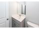 Bathroom featuring a gray vanity with white sink and ample counter space at 9620 Corby Ct, Summerville, SC 29485