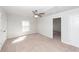 Bedroom featuring neutral carpet, ceiling fan, and natural light from a window at 9620 Corby Ct, Summerville, SC 29485