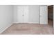 Neutral bedroom featuring plush carpeting, a large closet, and ample natural light at 9620 Corby Ct, Summerville, SC 29485