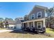 Charming two-story home with a welcoming porch and well-maintained landscaping at 9620 Corby Ct, Summerville, SC 29485