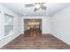 Open living room area leading to a modern kitchen with stainless steel appliances at 9620 Corby Ct, Summerville, SC 29485