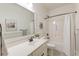 Bright bathroom with bronze fixtures, mosaic floors, and a shower-tub combination at 1006 Retreat Ave, Moncks Corner, SC 29461