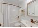 Clean bathroom with a shower-tub combination, white vanity, and modern mirror at 1006 Retreat Ave, Moncks Corner, SC 29461
