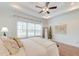 Bright bedroom with a large window, a decorative mirror, and a cozy rug for a relaxing ambiance at 1006 Retreat Ave, Moncks Corner, SC 29461