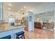 Open-concept kitchen flowing into the living area, featuring stainless appliances and granite countertops at 1006 Retreat Ave, Moncks Corner, SC 29461