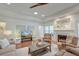 Spacious living room with fireplace, ceiling fan, recessed lighting, and comfortable seating at 1006 Retreat Ave, Moncks Corner, SC 29461