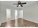 Bedroom featuring wood-look floors and multiple access doors at 1036 Oakcrest Dr, Charleston, SC 29412