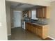 Functional kitchen with ample cabinet space, tile floors, and essential appliances at 105 Dalton Ave, North Charleston, SC 29420