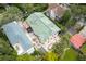 An aerial view showcases this home's backyard patio with an outdoor dining and lounge area at 111 S Battery St, Charleston, SC 29401