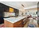 Spacious kitchen featuring a large island with marble countertops and a view into the living room at 111 S Battery St, Charleston, SC 29401