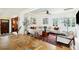 Bright and open living room featuring modern decor, herringbone floors, and large windows at 111 S Battery St, Charleston, SC 29401
