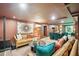 Bright, earthy living room featuring tan sofas, decorative pillows, and adjoining lounge and dining areas at 111 S Battery St, Charleston, SC 29401