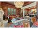 Inviting living room with views to the next room, marble fireplace, and stylish decor at 111 S Battery St, Charleston, SC 29401