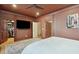 Spacious main bedroom boasting ample closet space, warm colors, and hardwood floors for a cozy retreat at 111 S Battery St, Charleston, SC 29401