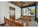 Relaxing porch with swings and wood floors at 111 S Battery St, Charleston, SC 29401