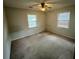 A bedroom featuring a ceiling fan and two windows at 113 Germantown Rd, Summerville, SC 29483