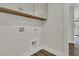 Bright laundry room with upper cabinets and new connections at 117 Grange Cir, Summerville, SC 29486