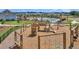 A community playground with swings, a climbing wall, and a slide providing a fun and active space for children at 117 Grange Cir, Summerville, SC 29486